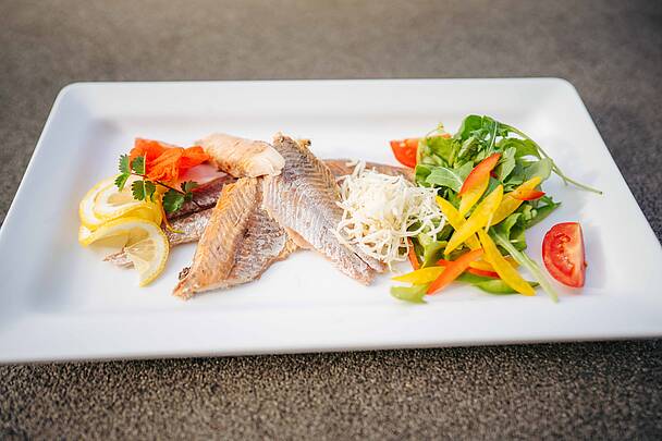 Slow Food Village Millstatt Fischgericht  